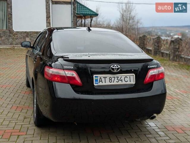 Черный Тойота Камри, объемом двигателя 2.4 л и пробегом 238 тыс. км за 7699 $, фото 13 на Automoto.ua
