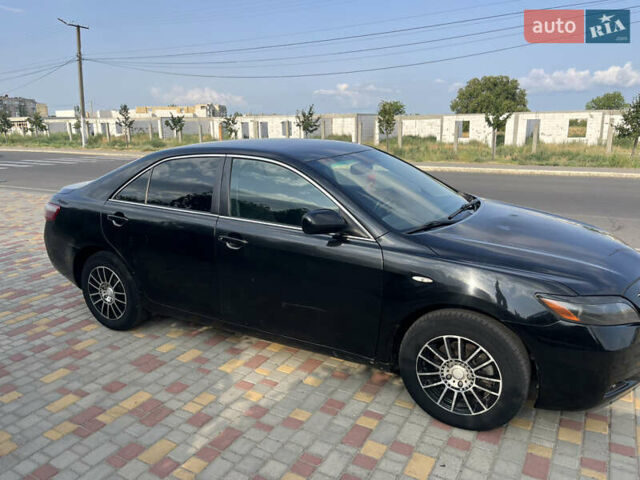 Черный Тойота Камри, объемом двигателя 2.36 л и пробегом 260 тыс. км за 7800 $, фото 2 на Automoto.ua