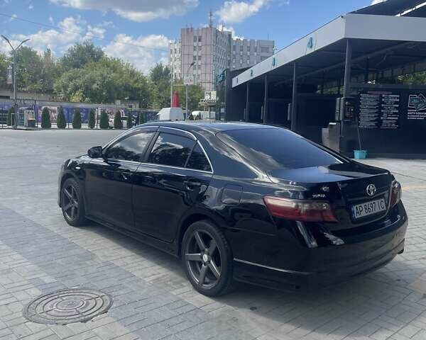 Черный Тойота Камри, объемом двигателя 2.36 л и пробегом 253 тыс. км за 9600 $, фото 2 на Automoto.ua