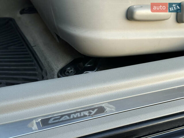 Черный Тойота Камри, объемом двигателя 2.4 л и пробегом 134 тыс. км за 11900 $, фото 67 на Automoto.ua