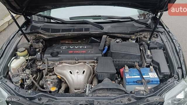 Черный Тойота Камри, объемом двигателя 2.4 л и пробегом 310 тыс. км за 7700 $, фото 18 на Automoto.ua