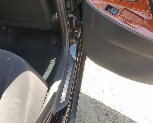 Черный Тойота Камри, объемом двигателя 2.4 л и пробегом 267 тыс. км за 8200 $, фото 16 на Automoto.ua