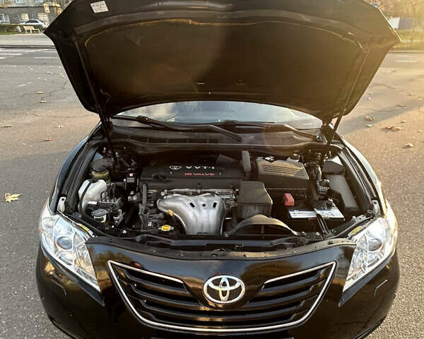 Черный Тойота Камри, объемом двигателя 2.4 л и пробегом 263 тыс. км за 8500 $, фото 7 на Automoto.ua