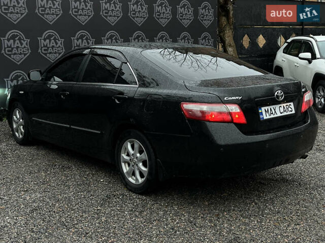 Черный Тойота Камри, объемом двигателя 2.4 л и пробегом 208 тыс. км за 7900 $, фото 6 на Automoto.ua