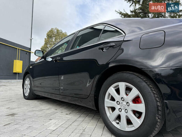 Черный Тойота Камри, объемом двигателя 3.5 л и пробегом 246 тыс. км за 11000 $, фото 27 на Automoto.ua