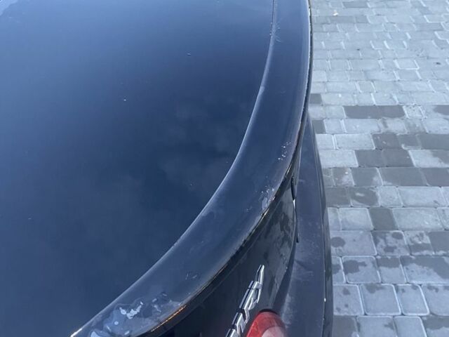 Черный Тойота Камри, объемом двигателя 2.4 л и пробегом 274 тыс. км за 7500 $, фото 4 на Automoto.ua