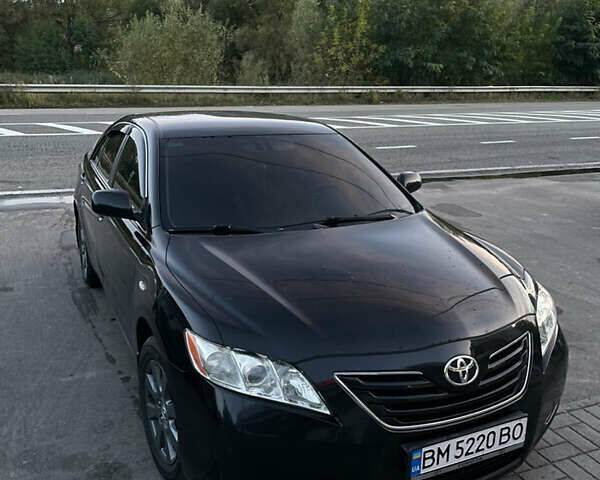 Черный Тойота Камри, объемом двигателя 2.36 л и пробегом 164 тыс. км за 8900 $, фото 7 на Automoto.ua