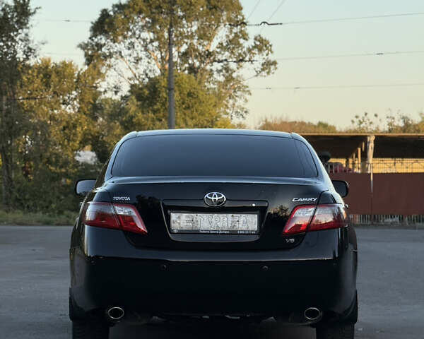 Чорний Тойота Камрі, об'ємом двигуна 3.46 л та пробігом 225 тис. км за 10300 $, фото 11 на Automoto.ua
