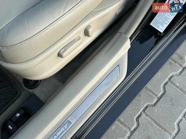 Черный Тойота Камри, объемом двигателя 2.4 л и пробегом 134 тыс. км за 11900 $, фото 74 на Automoto.ua