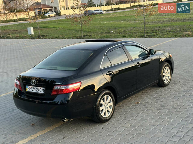 Черный Тойота Камри, объемом двигателя 2.4 л и пробегом 134 тыс. км за 11900 $, фото 34 на Automoto.ua