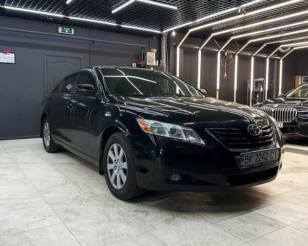 Черный Тойота Камри, объемом двигателя 2.36 л и пробегом 197 тыс. км за 9500 $, фото 2 на Automoto.ua