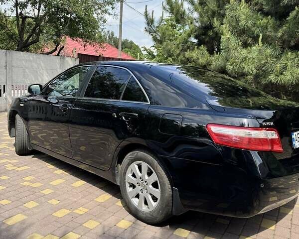 Черный Тойота Камри, объемом двигателя 2.36 л и пробегом 238 тыс. км за 9500 $, фото 13 на Automoto.ua