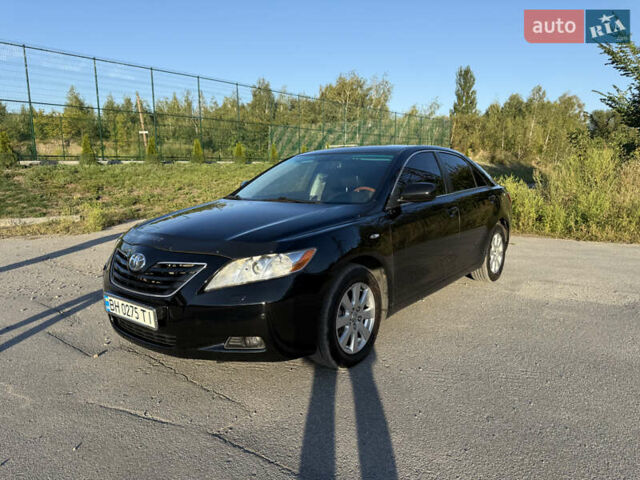 Черный Тойота Камри, объемом двигателя 3.5 л и пробегом 252 тыс. км за 9500 $, фото 1 на Automoto.ua