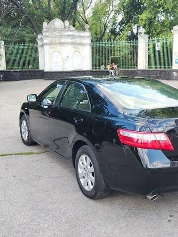 Черный Тойота Камри, объемом двигателя 3.5 л и пробегом 94 тыс. км за 15000 $, фото 4 на Automoto.ua