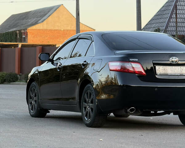 Чорний Тойота Камрі, об'ємом двигуна 3.46 л та пробігом 225 тис. км за 10300 $, фото 10 на Automoto.ua