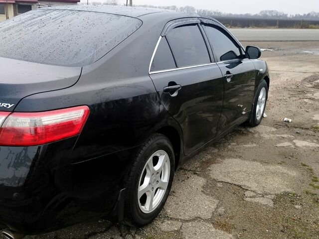 Черный Тойота Камри, объемом двигателя 2.4 л и пробегом 290 тыс. км за 9000 $, фото 10 на Automoto.ua