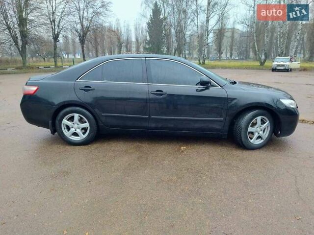 Черный Тойота Камри, объемом двигателя 2.4 л и пробегом 367 тыс. км за 7900 $, фото 3 на Automoto.ua