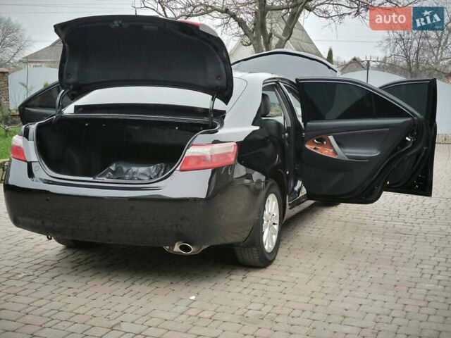 Черный Тойота Камри, объемом двигателя 2.36 л и пробегом 225 тыс. км за 9990 $, фото 22 на Automoto.ua