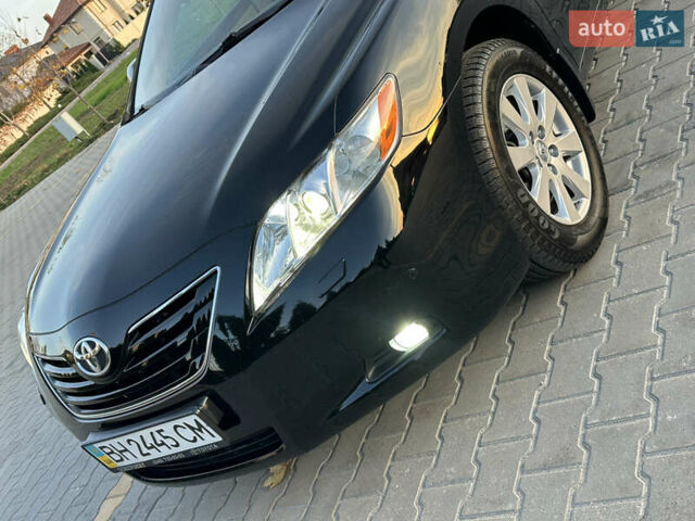 Черный Тойота Камри, объемом двигателя 2.4 л и пробегом 134 тыс. км за 11900 $, фото 44 на Automoto.ua