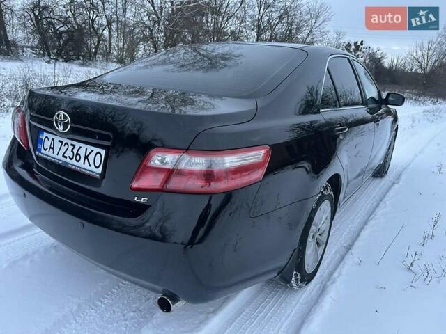 Черный Тойота Камри, объемом двигателя 2.36 л и пробегом 251 тыс. км за 7350 $, фото 8 на Automoto.ua
