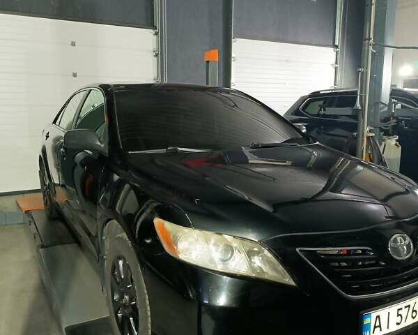 Черный Тойота Камри, объемом двигателя 3.46 л и пробегом 320 тыс. км за 8300 $, фото 3 на Automoto.ua