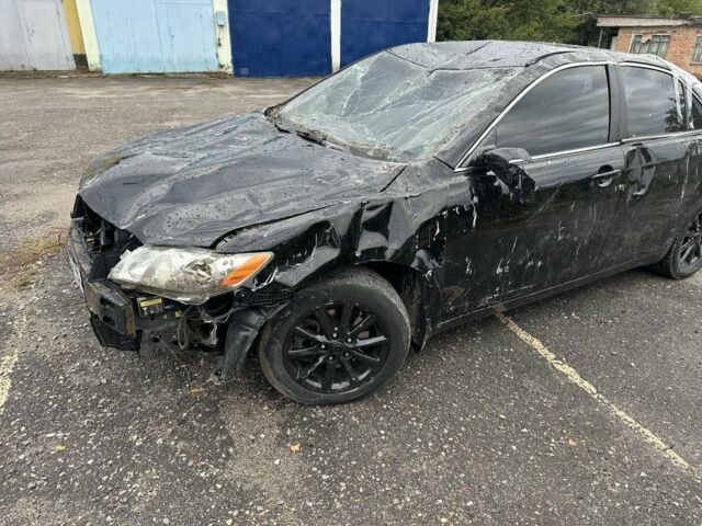 Черный Тойота Камри, объемом двигателя 2.4 л и пробегом 200 тыс. км за 4000 $, фото 2 на Automoto.ua