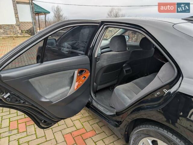 Черный Тойота Камри, объемом двигателя 2.4 л и пробегом 238 тыс. км за 7699 $, фото 19 на Automoto.ua