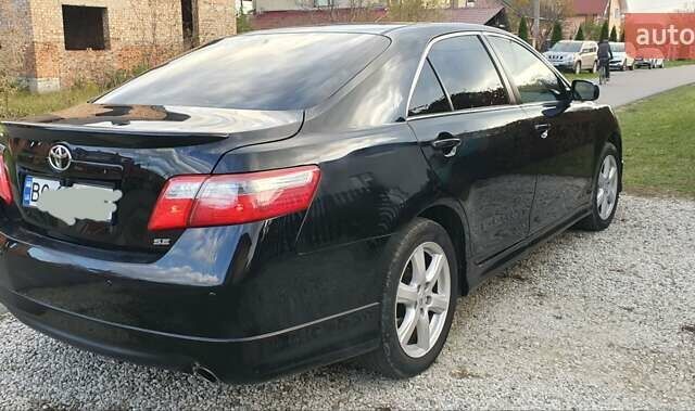 Черный Тойота Камри, объемом двигателя 2.4 л и пробегом 173 тыс. км за 7999 $, фото 1 на Automoto.ua