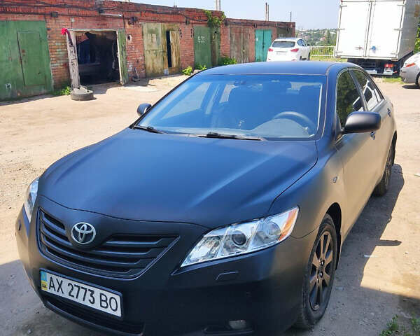 Черный Тойота Камри, объемом двигателя 2.4 л и пробегом 267 тыс. км за 8200 $, фото 5 на Automoto.ua