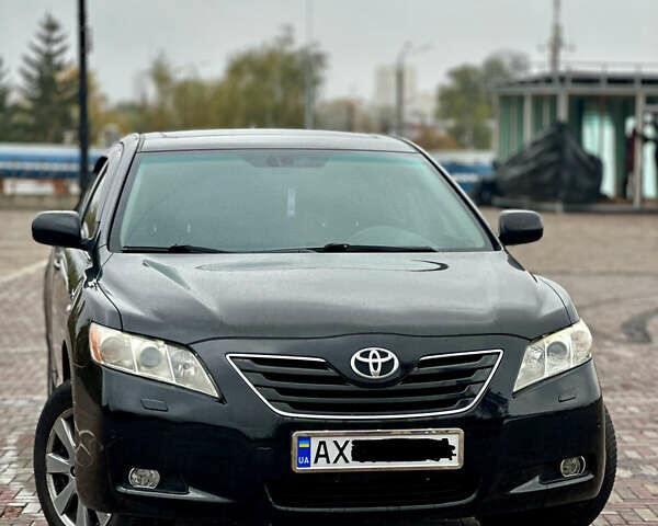 Черный Тойота Камри, объемом двигателя 3.5 л и пробегом 315 тыс. км за 8500 $, фото 1 на Automoto.ua