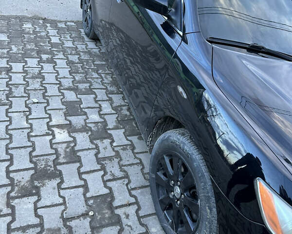 Черный Тойота Камри, объемом двигателя 2.36 л и пробегом 240 тыс. км за 9600 $, фото 1 на Automoto.ua