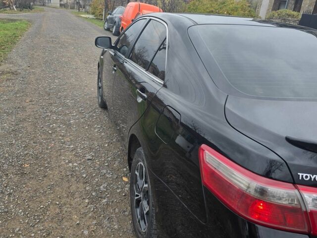 Черный Тойота Камри, объемом двигателя 3.5 л и пробегом 300 тыс. км за 7800 $, фото 4 на Automoto.ua