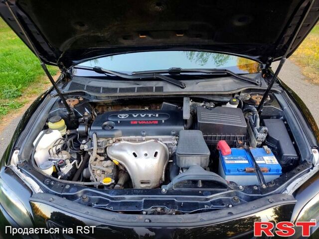 Чорний Тойота Камрі, об'ємом двигуна 2.4 л та пробігом 235 тис. км за 8700 $, фото 5 на Automoto.ua