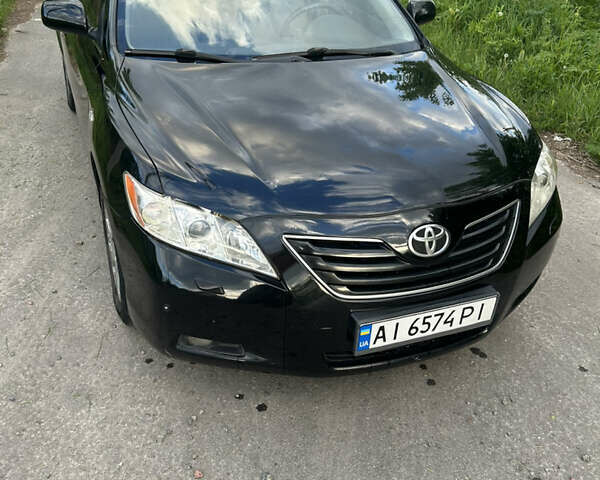 Черный Тойота Камри, объемом двигателя 2.4 л и пробегом 306 тыс. км за 8000 $, фото 10 на Automoto.ua