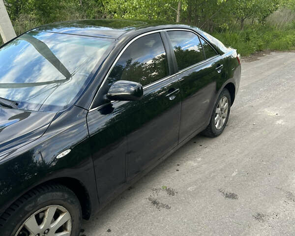 Черный Тойота Камри, объемом двигателя 2.4 л и пробегом 306 тыс. км за 8000 $, фото 6 на Automoto.ua