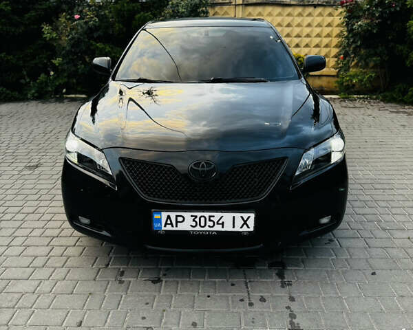 Чорний Тойота Камрі, об'ємом двигуна 3.46 л та пробігом 375 тис. км за 7500 $, фото 2 на Automoto.ua