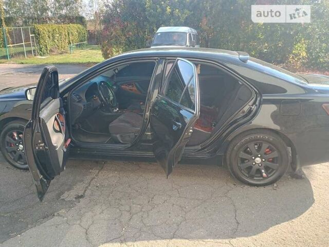 Чорний Тойота Камрі, об'ємом двигуна 2.36 л та пробігом 270 тис. км за 8800 $, фото 5 на Automoto.ua