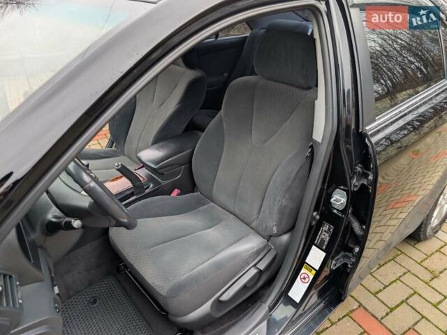 Черный Тойота Камри, объемом двигателя 2.4 л и пробегом 238 тыс. км за 7699 $, фото 31 на Automoto.ua