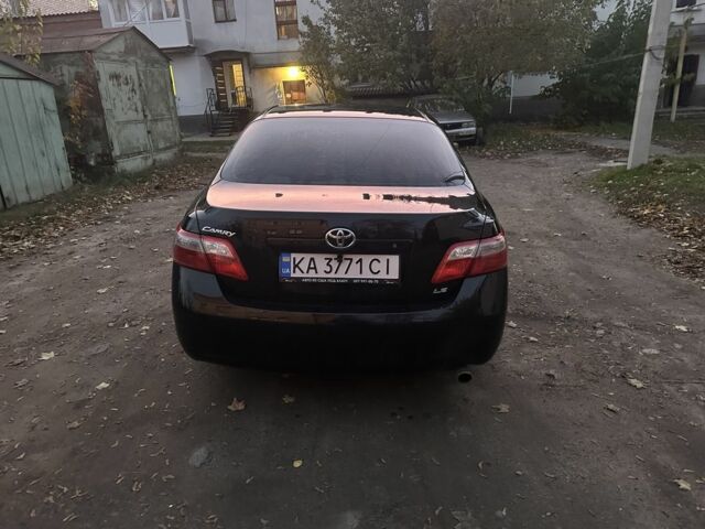 Черный Тойота Камри, объемом двигателя 2.4 л и пробегом 250 тыс. км за 7000 $, фото 2 на Automoto.ua