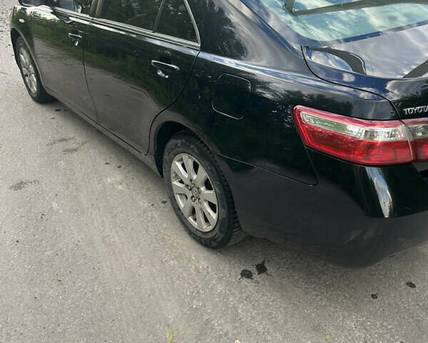 Черный Тойота Камри, объемом двигателя 2.4 л и пробегом 306 тыс. км за 8000 $, фото 7 на Automoto.ua