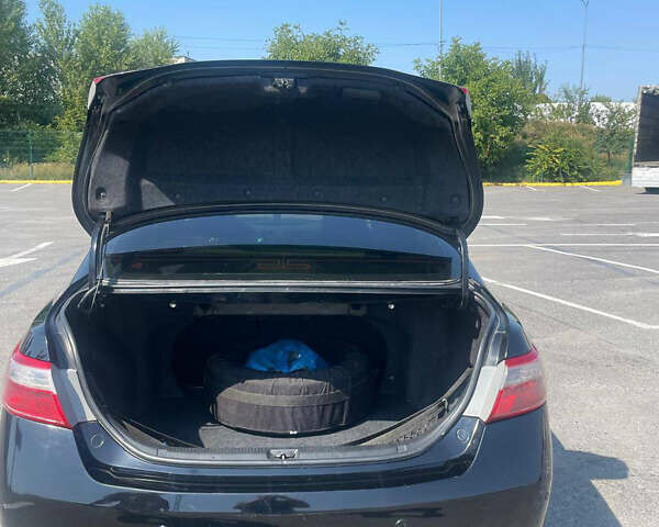 Черный Тойота Камри, объемом двигателя 2.36 л и пробегом 282 тыс. км за 7499 $, фото 12 на Automoto.ua