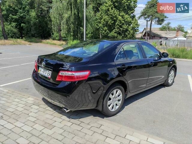 Черный Тойота Камри, объемом двигателя 2.36 л и пробегом 318 тыс. км за 7600 $, фото 8 на Automoto.ua