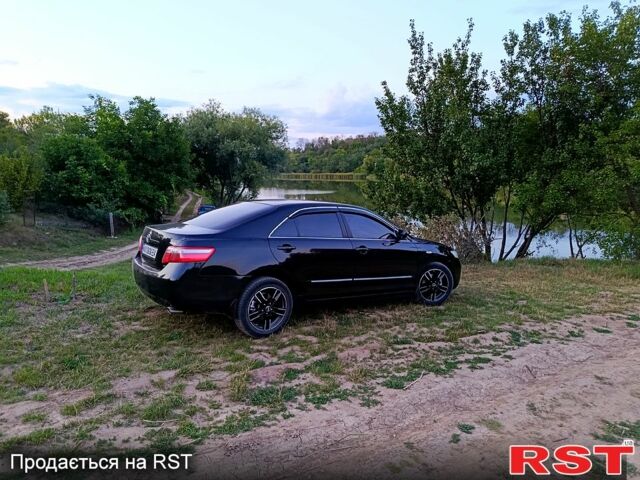 Черный Тойота Камри, объемом двигателя 2.4 л и пробегом 202 тыс. км за 9500 $, фото 11 на Automoto.ua