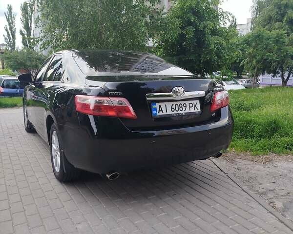 Черный Тойота Камри, объемом двигателя 3.46 л и пробегом 227 тыс. км за 10500 $, фото 1 на Automoto.ua