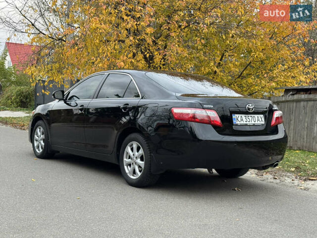 Черный Тойота Камри, объемом двигателя 2.4 л и пробегом 189 тыс. км за 8600 $, фото 26 на Automoto.ua