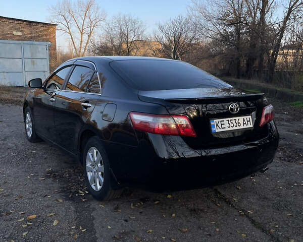 Черный Тойота Камри, объемом двигателя 2.4 л и пробегом 366 тыс. км за 6500 $, фото 2 на Automoto.ua