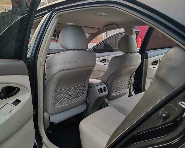 Черный Тойота Камри, объемом двигателя 2.36 л и пробегом 240 тыс. км за 11000 $, фото 13 на Automoto.ua