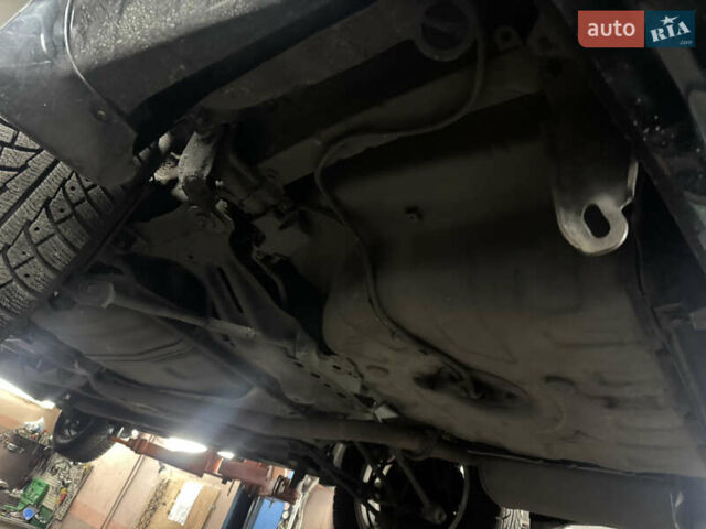 Черный Тойота Камри, объемом двигателя 2.4 л и пробегом 189 тыс. км за 8600 $, фото 31 на Automoto.ua