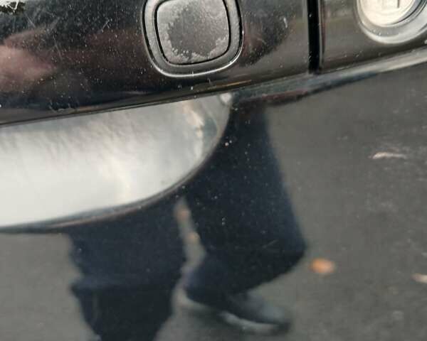 Черный Тойота Камри, объемом двигателя 2.36 л и пробегом 268 тыс. км за 9500 $, фото 12 на Automoto.ua