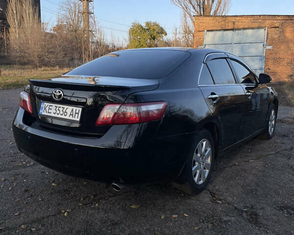 Черный Тойота Камри, объемом двигателя 2.4 л и пробегом 366 тыс. км за 6500 $, фото 4 на Automoto.ua